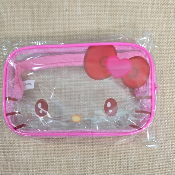 Sanrio Handbags - SALE* Sanrio Hello Kitty Transparent Pink Pouch NWOT